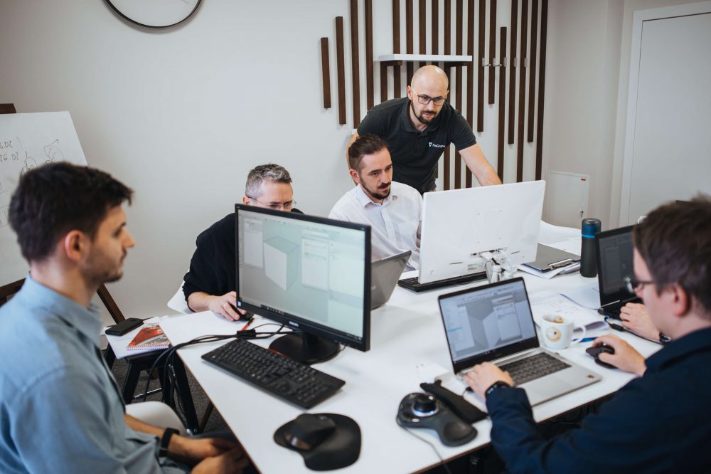 Zespół pracowników podczas szkolenia zorganizowanego przez firmę Norton